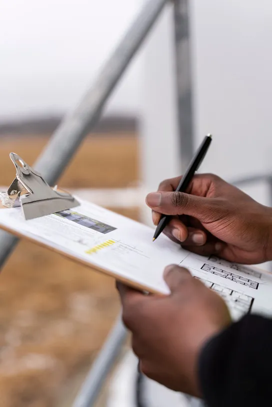 close-up-hand-filling-document.jpg